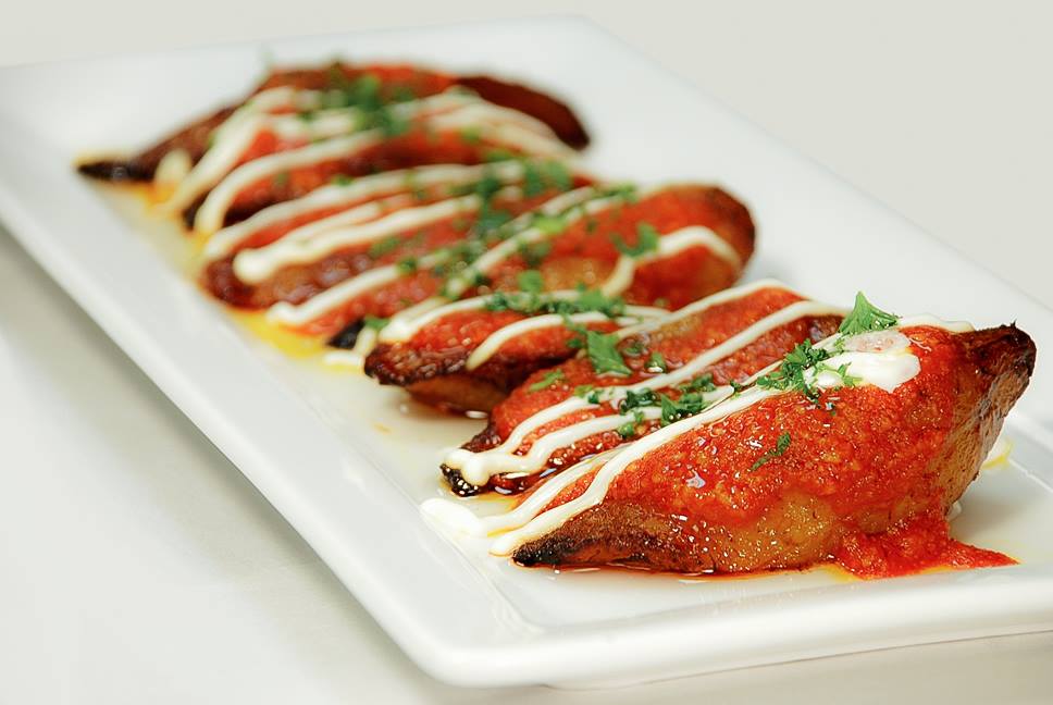 Potato croquettes with sour cream and chives
